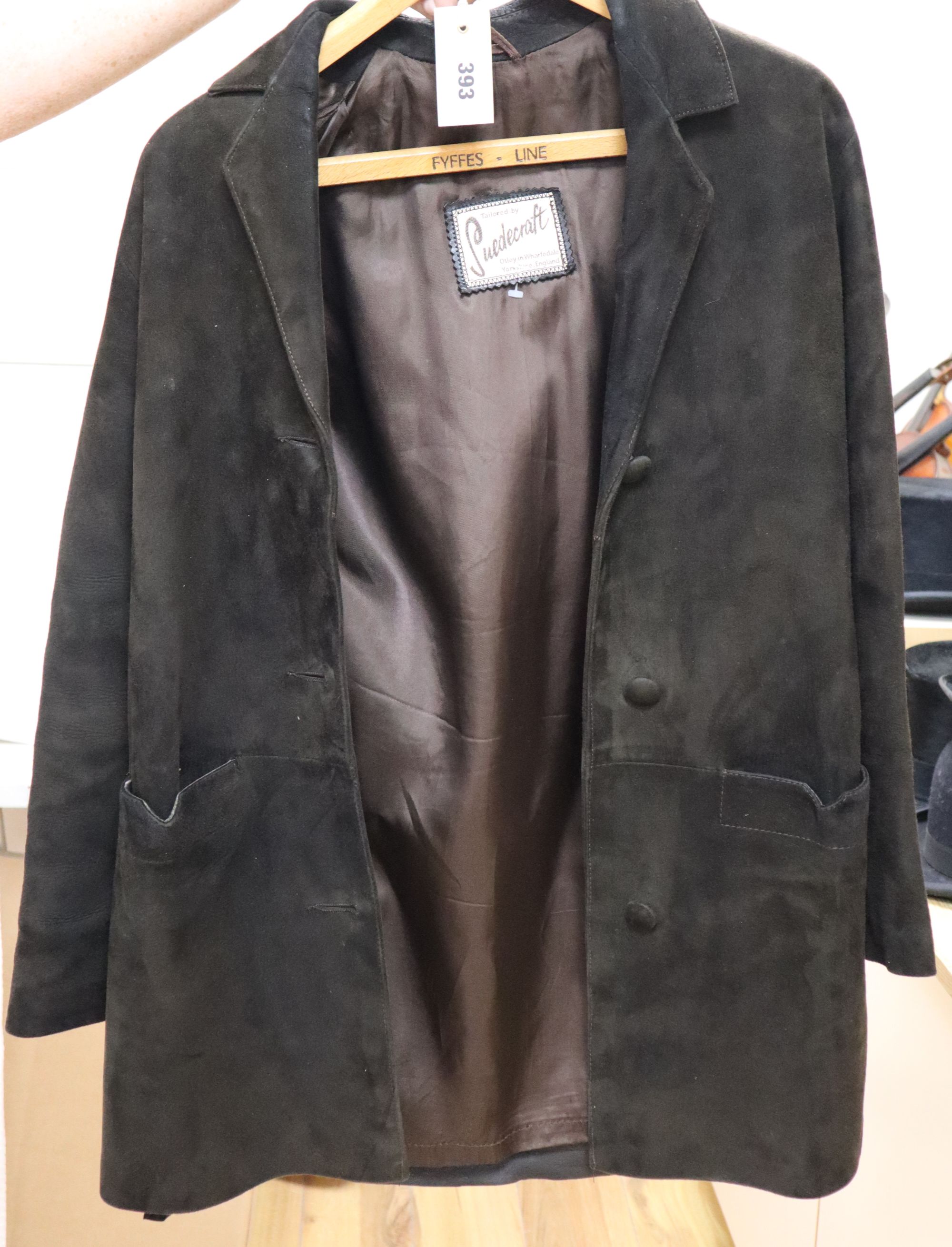 A light tan 1960s suede jacket and a similar chocolate brown jacket